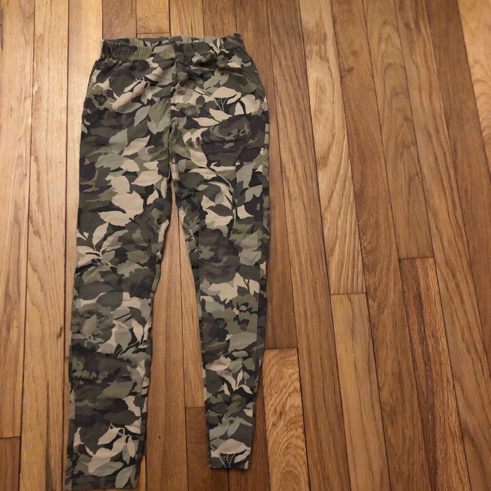 Green camoflage pants.